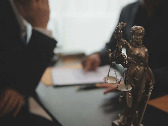 Close-up of a judge&rsquo;s gavel in a courtroom setting, symbolizing trial-ready representation from a New York City Uber accident lawyer after a rideshare crash